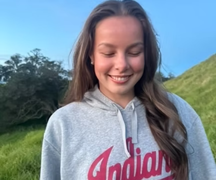 Portrait of Amelia in an Indiana hoodie
