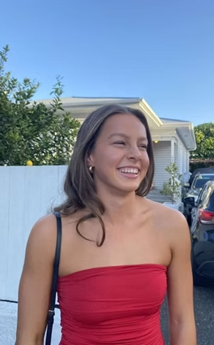Amelia smiling outdoors